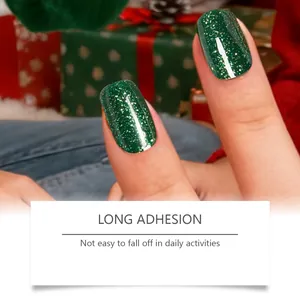 Detailed view of green glitter Christmas nail stickers with long adhesion feature