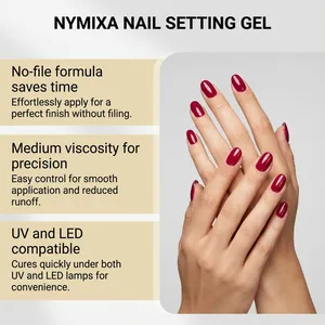 Professional berry red nail finish effect created with Nymixa nail setting gel.