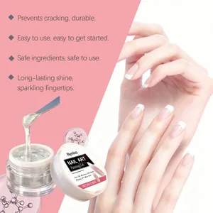 Close-up of Nymixa clear nail art painting gel with a spatula and manicured hands