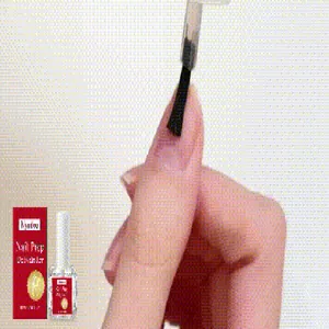 Close-up detail of Nymixa nail prep dehydrator being applied to a clean fingernail for manicure