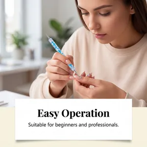 Professional nail art dotting tool in use for precise rhinestone application on nails.