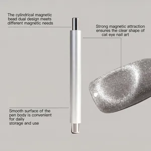 Close-up of a silver magnetic pen demonstrating a sparkling cat-eye effect on nails