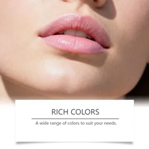 Close-up detail of long-wear velvet lip gloss pen applied on lips in light pink color
