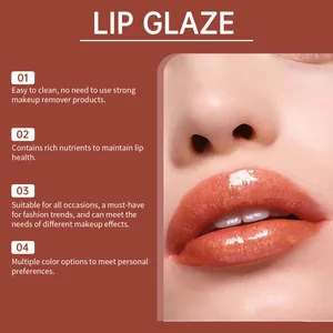 Feuchtigkeitsspendender Lipgloss in glitzerndem Orange für intensiven Glanz im Detail