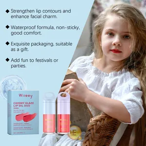 Detailed view of Wiieey kids lip oil set featuring Sakura and Ruby Red shades for girls
