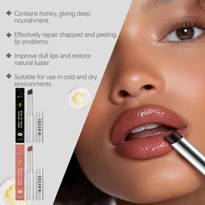 Detail shot of EELHOE nourishing honey tinted lip balm being applied for a glossy finish.
