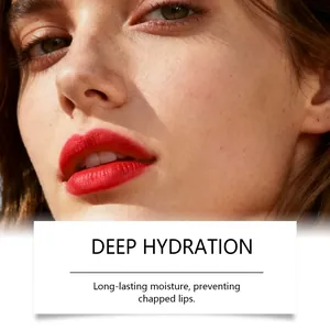 High-definition detail showing deep hydration effect of red matte lip gloss on model's lips