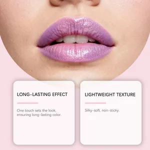 Macro view of shimmering purple lip gloss application with lightweight texture