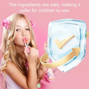 Detailed view of safety-tested pink toy lipstick applied by a child on pink background