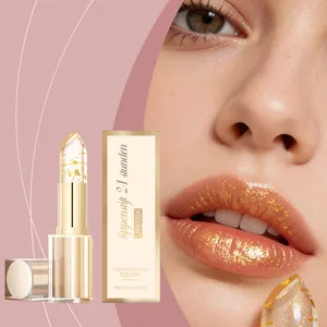 Close-up of gold foil temperature changing lipstick with glossy lip application effect