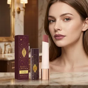 Detail of zephoco matte lipstick in reddish-brown showing the texture and packaging