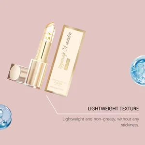 Macro view of gold foil moisturizing lipstick texture on a soft pink background
