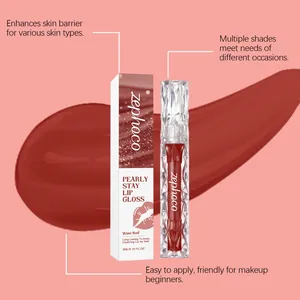 Vista detallada del brillo labial Zephoco rojo vino con envase elegante de cristal de lujo