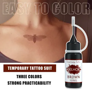 Brown temporary tattoo ink bottle showing a moth design on skin for easy application