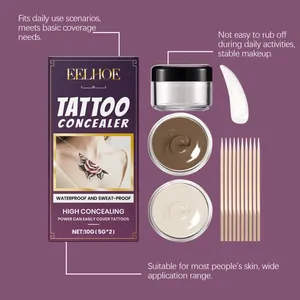 Detailed view of EELHOE tattoo concealer kit featuring two shades and applicator sticks
