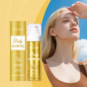 EELHOE SPF 30 body glow oil with gold shimmer packaging next to a model in the sun