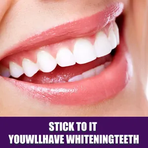 Close-up detail of bright white teeth showing results after using purple whitening tooth pen