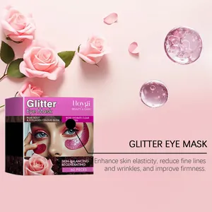 HOYGI Glitter Eye Mask συσκευασία και περιγραφή οφελών σε φόντο με ροζ τριαντάφυλλα