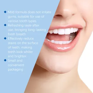 Gros plan sur des dents blanches montrant l'effet blanchissant des pastilles de dentifrice