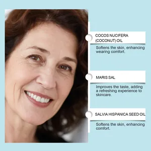 Close-up of white teeth with ingredient list including coconut oil and sea salt for care