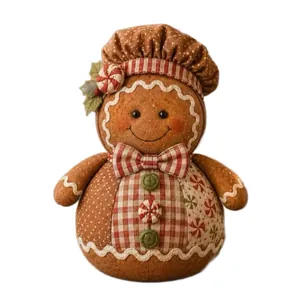 Handmade quilted gingerbread man fabric ornament for rustic Christmas tabletop decor