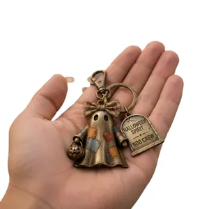 Vintage Halloween Geist Schlüsselanhänger aus Bronze mit Grabstein und Kürbis-Korb