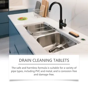 Drain cleaning tablets dissolving in a stainless steel sink for safe pipe maintenance.