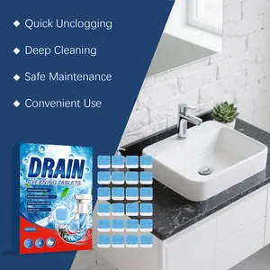 Close-up of 24 drain cleaning tablets next to a modern white bathroom sink area.