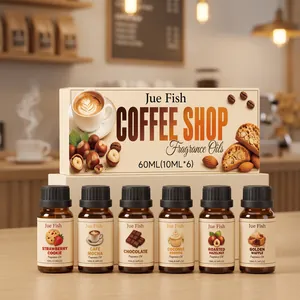 Set of 6 Jue Fish coffee shop themed fragrance oils in amber bottles on a cafe table