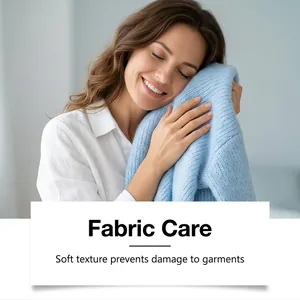 Detail view of soft blue fabric illustrating gentle laundry care for garments.