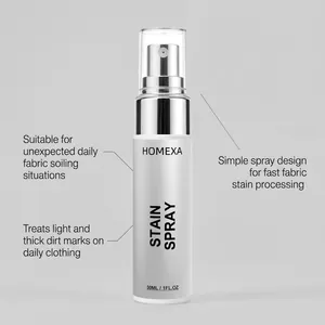 Detailed view of HOMEXA fabric stain spray bottle with usage instructions for laundry