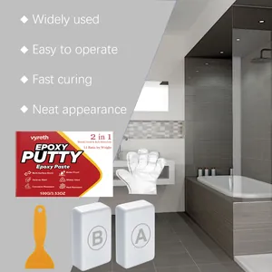 Vyreth 2-in-1 epoxy putty kit for tile repair with spatula and gloves in bathroom.