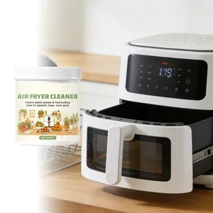 Close-up of air fryer cleaner powder jar in kitchen setting for grease removal.