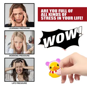 Small yellow rubber duck toy held in hand for effective stress relief demonstration