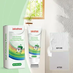 Detail view showing Jakehoe wall patching paste application on a cracked white wall surface
