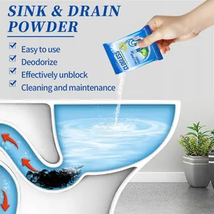 Close-up of sink and drain powder being poured into a clogged pipe section for cleaning