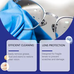 Close-up of cleaning glasses lens with blue cloth to remove grease and stains for clarity