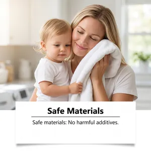 Detail showing a mother and child with a soft white towel, highlighting safe materials.