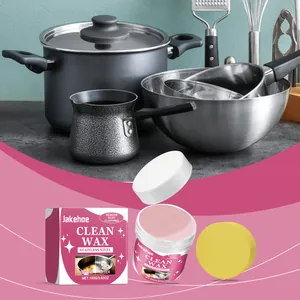 Close-up of Jakehoe stainless steel cleaning paste with box and yellow sponge for cookware
