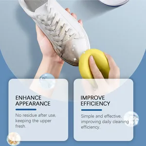 Detailed macro view showing white sneaker cleaning process with sponge and cream
