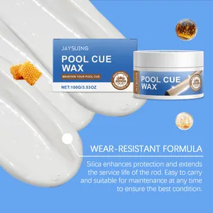Close-up detail of wear-resistant pool cue wax with creamy texture and silica protection