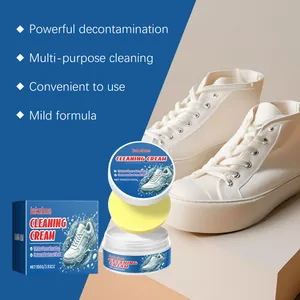 Detailed view of Jakehoe white shoe cleaning cream with sponge and clean sneakers