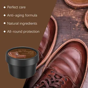 Close-up detail of Jue Fish leather nourishing cream with treated brown leather shoes