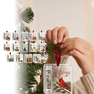 Detail of creative Christmas money holder ornaments being hung on a tree