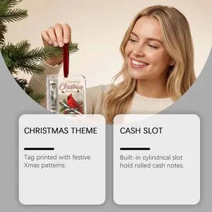 Close-up of a Christmas cardinal ornament with a built-in cylindrical cash slot detail.
