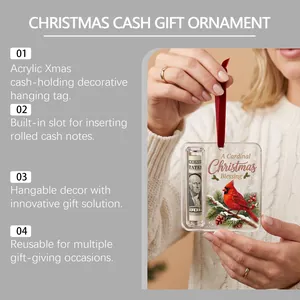 Detailed view of a clear acrylic Christmas cardinal ornament with a cash holder slot