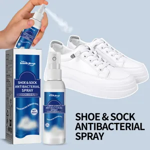 Spray antibactérien South Moon pour chaussures et chaussettes flacon et boîte à côté de baskets