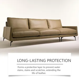 Protective leather care cream applied to a tan sofa to prevent stains and scratches