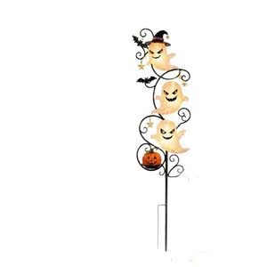 Solar-powered Halloween garden stake lights featuring three glowing ghosts and a pumpkin