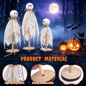 Détail du tissu de gaze blanc et de la base en bois des décorations d'Halloween